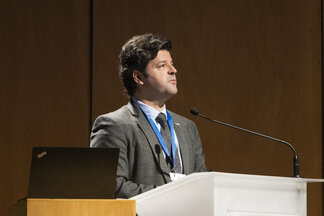 Speaker presenting on stage