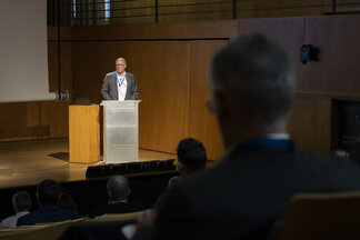 Speaker presenting on stage